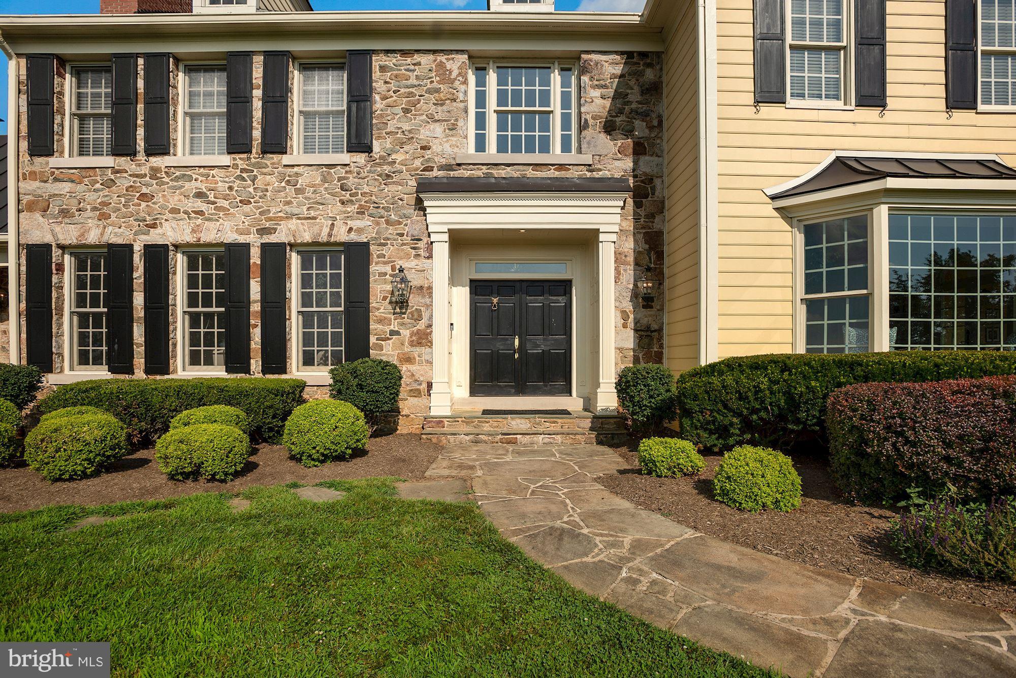 15140 Loyalty Road Waterford, VA 20197 - Photo 51 of 60 a view of a house with a garden