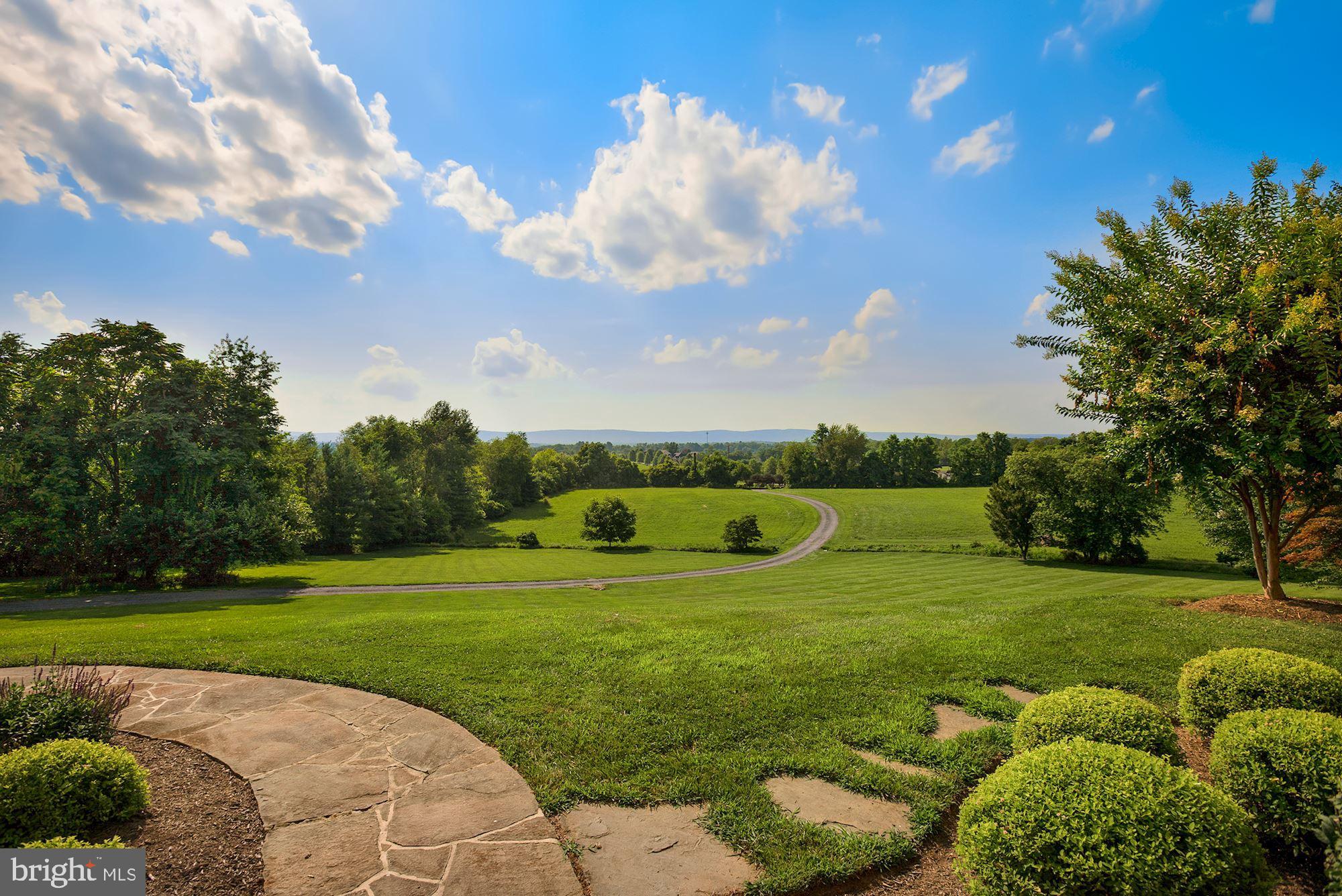 15140 Loyalty Road Waterford, VA 20197 - Photo 59 of 60 a view of a golf course with a garden