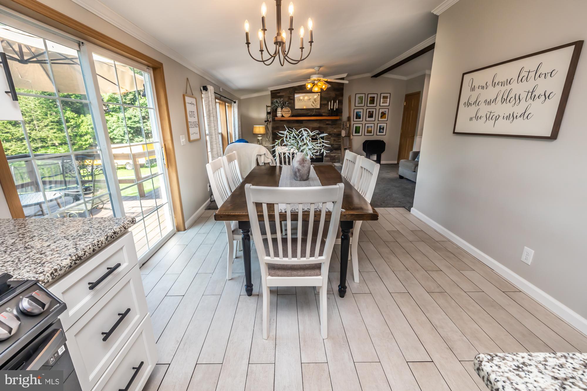 239 Quarry Road Gap, PA 17527 - Photo 19 of 48 a view of a dining room with furniture window and wooden floor