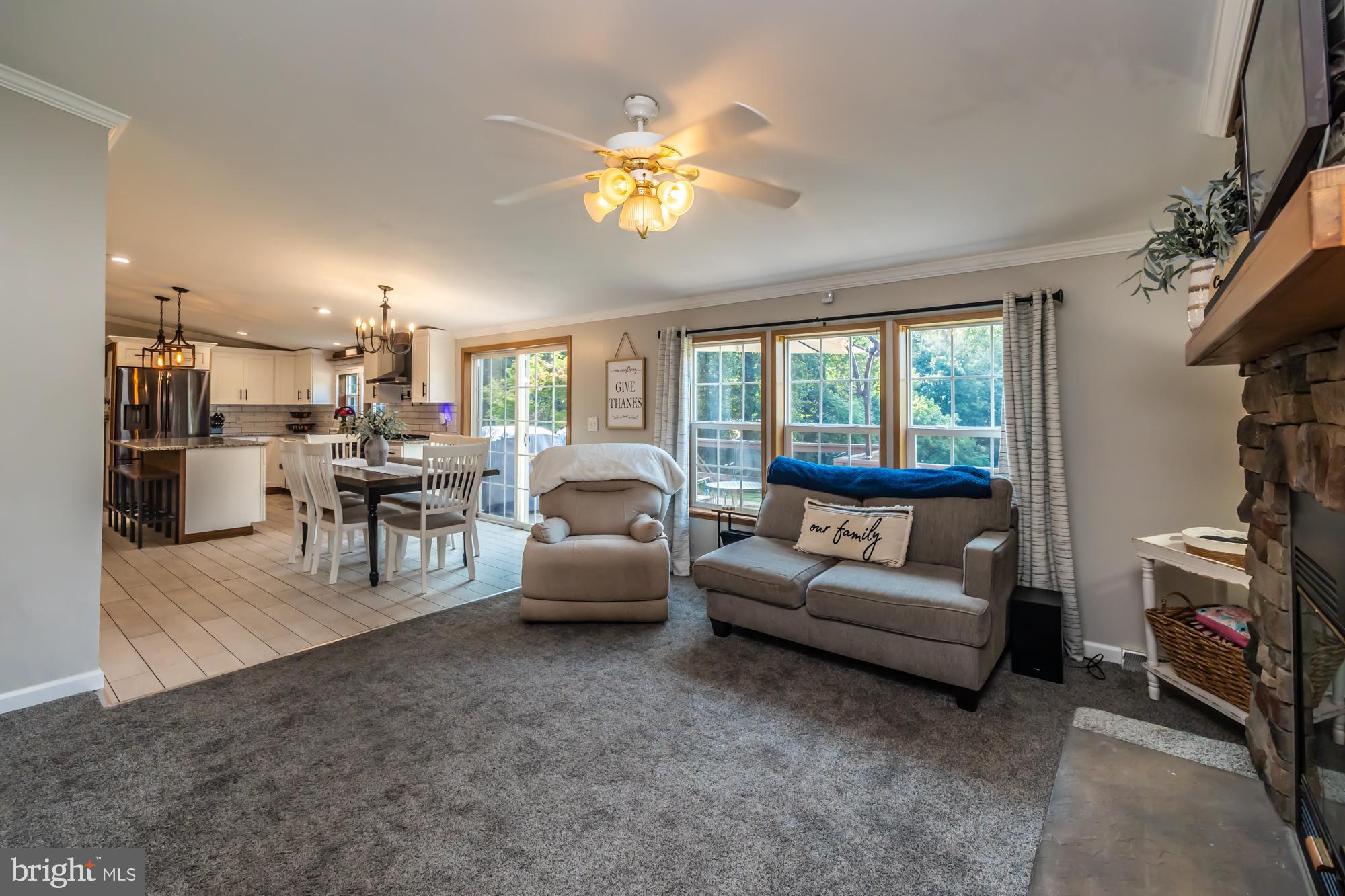 239 Quarry Road Gap, PA 17527 - Photo 23 of 48 a living room with furniture and a large window
