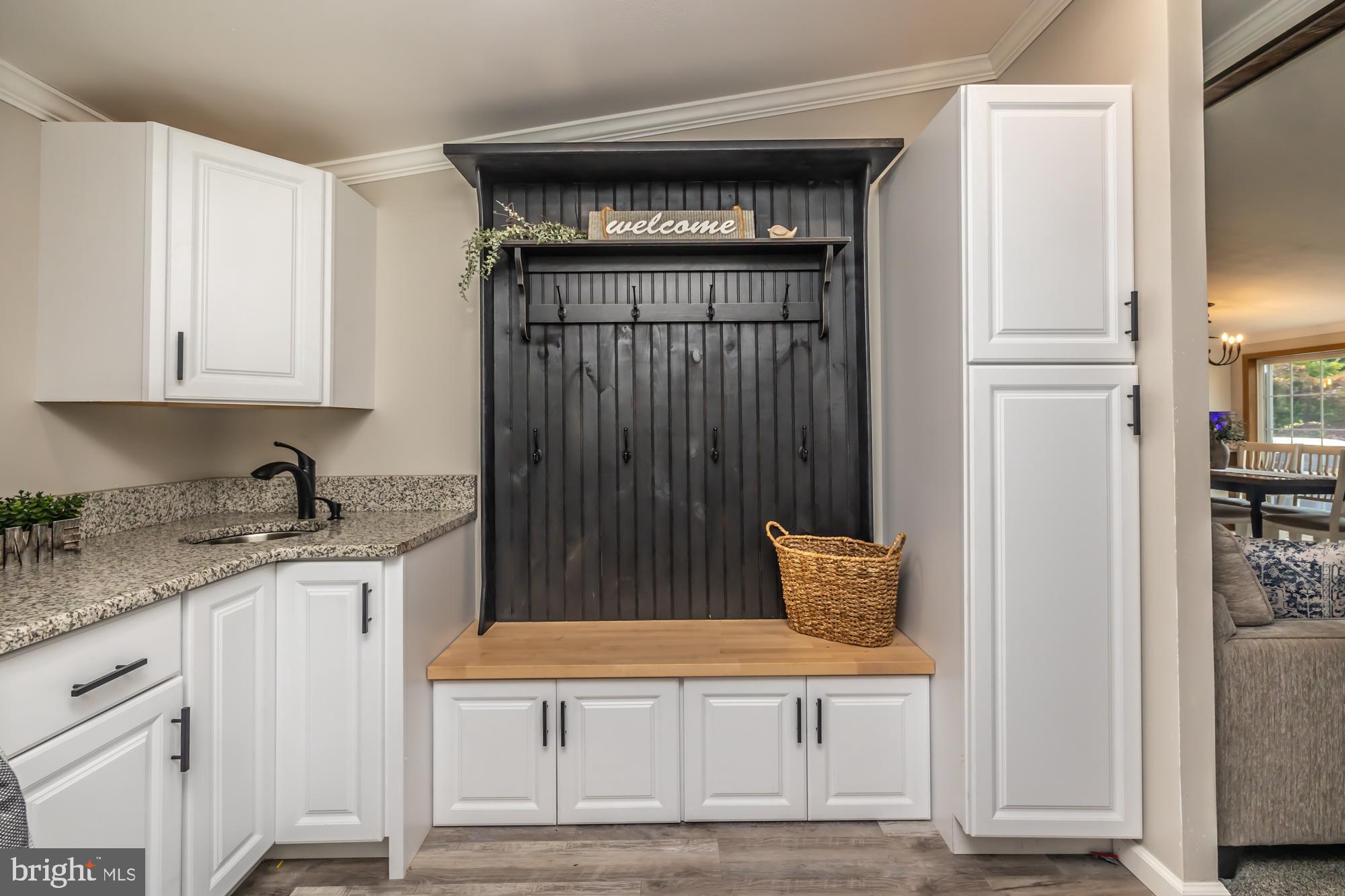 239 Quarry Road Gap, PA 17527 - Photo 26 of 48 a kitchen with granite countertop a refrigerator and cabinets