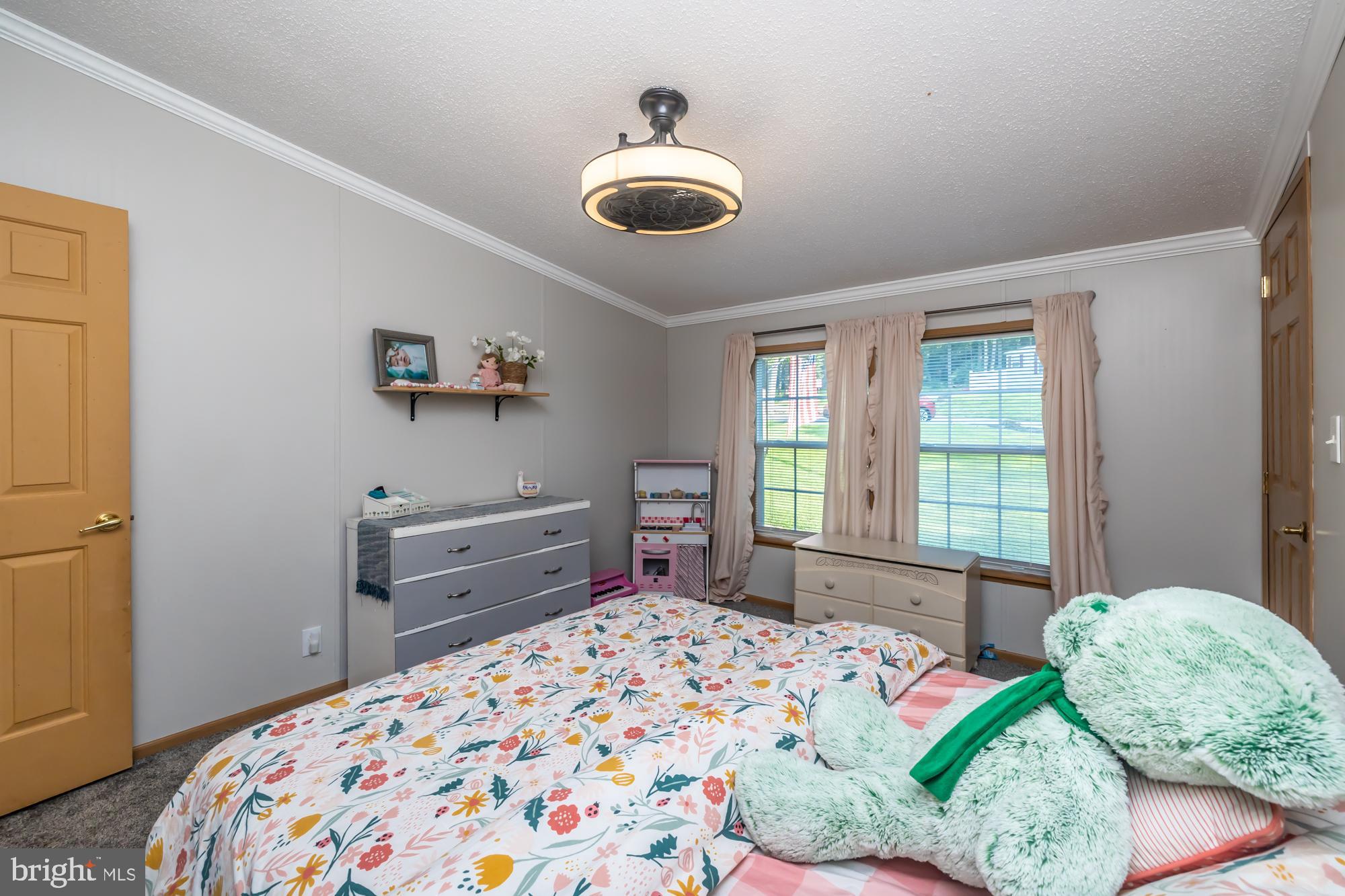 239 Quarry Road Gap, PA 17527 - Photo 36 of 48 a bedroom with a bed and a window