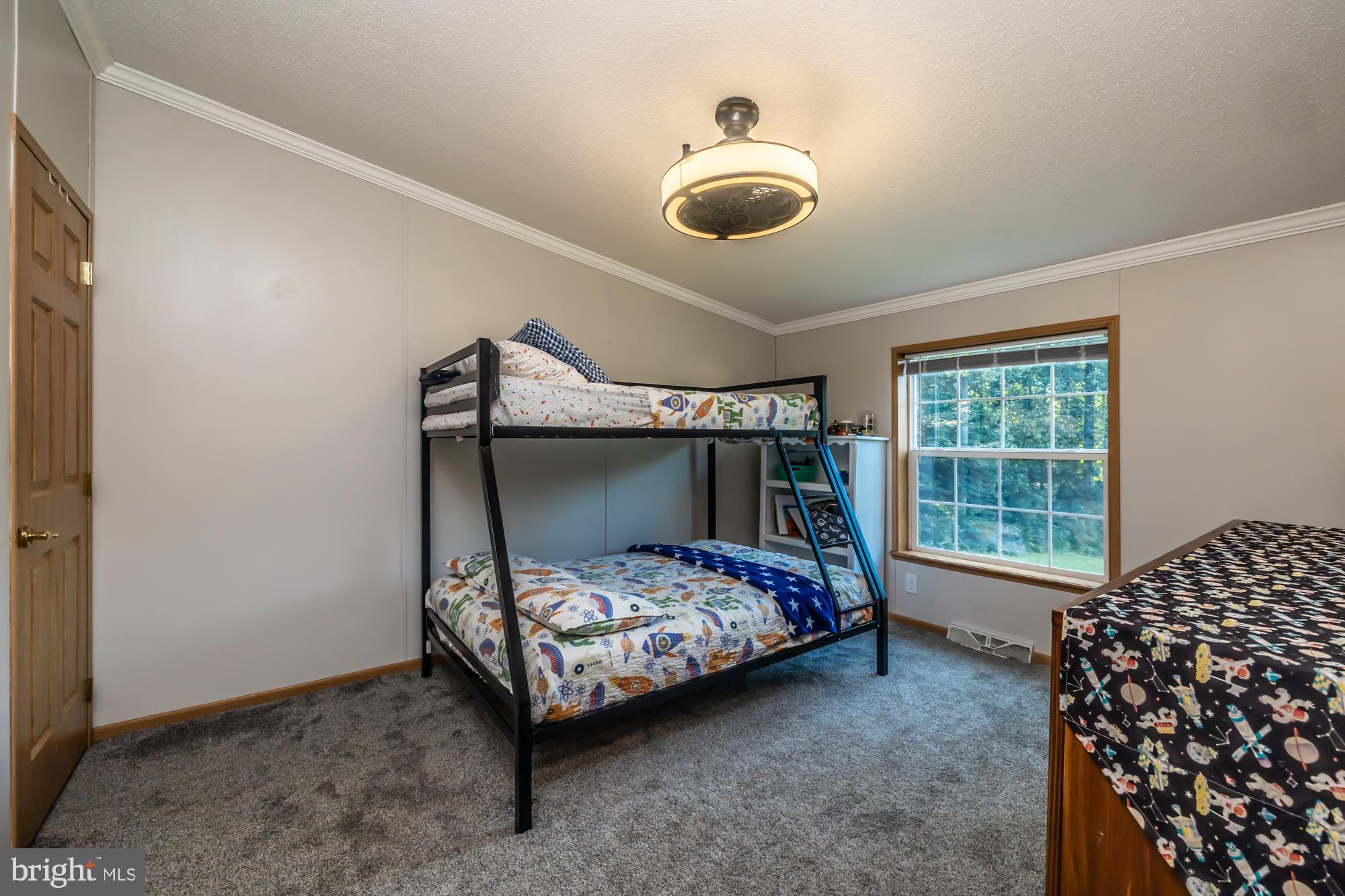 239 Quarry Road Gap, PA 17527 - Photo 39 of 48 a bedroom with a bed and a window