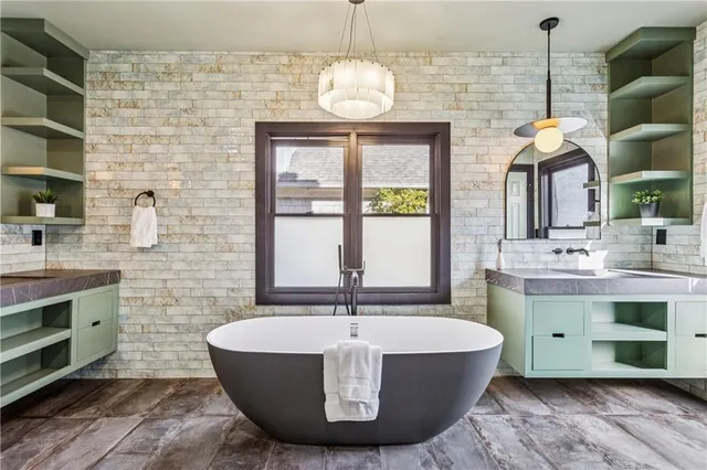 a room with a table and chandelier