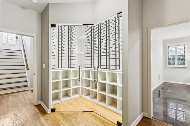 a view of a room with a large window and floor to ceiling window