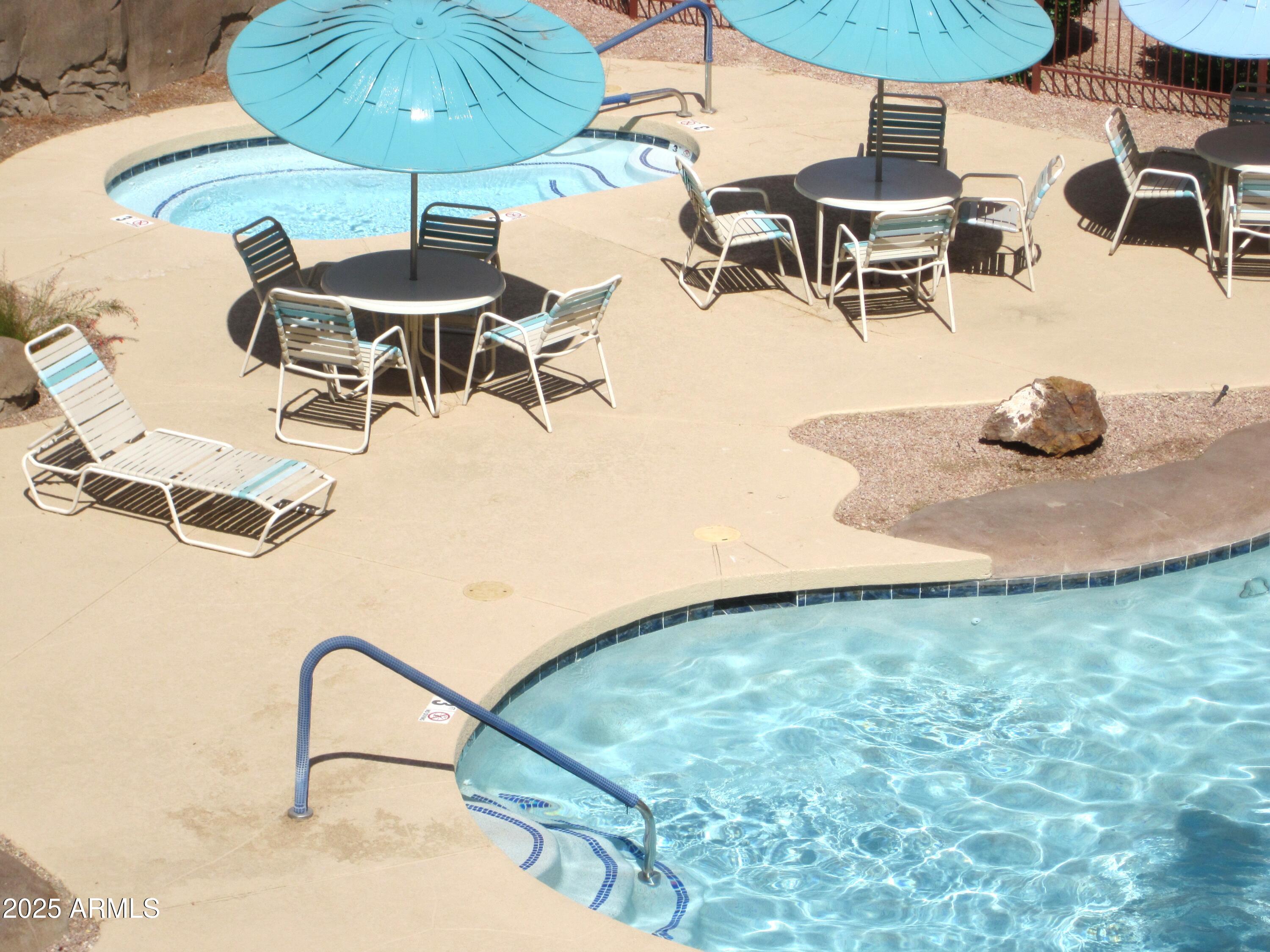 12222 North Paradise Village Parkway West, Unit 325 Phoenix, AZ 85032 - Photo 15 of 28 an outdoor space with furniture