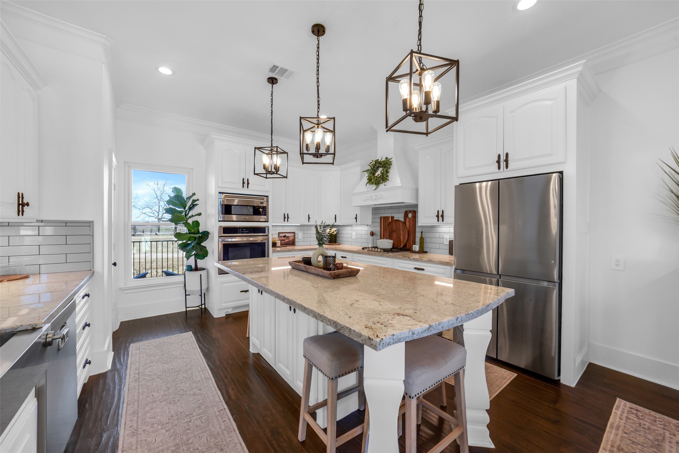 3103 Brundrett Road Wallis, TX 77485 - Photo 11 of 50 Light-filled kitchen with timeless finishes and generous storage.