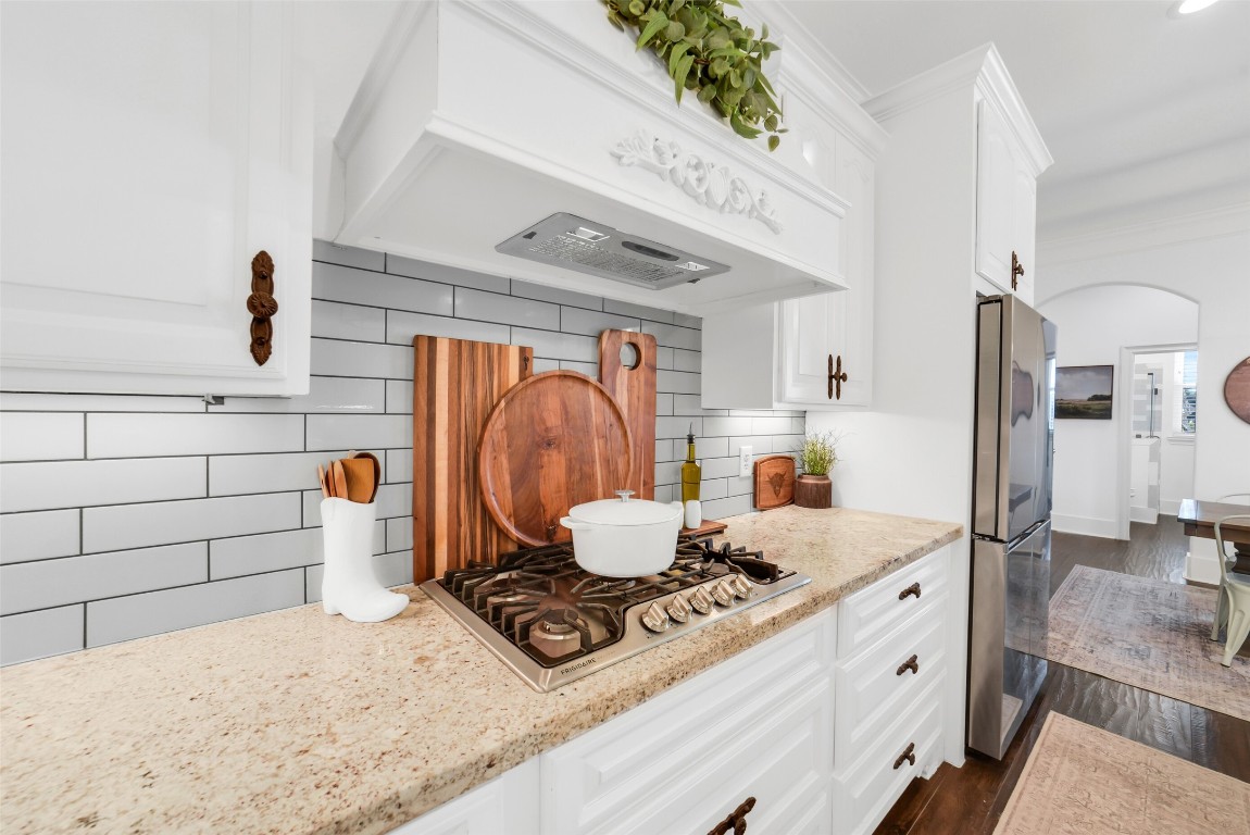 3103 Brundrett Road Wallis, TX 77485 - Photo 13 of 50 a kitchen with a refrigerator and a stove