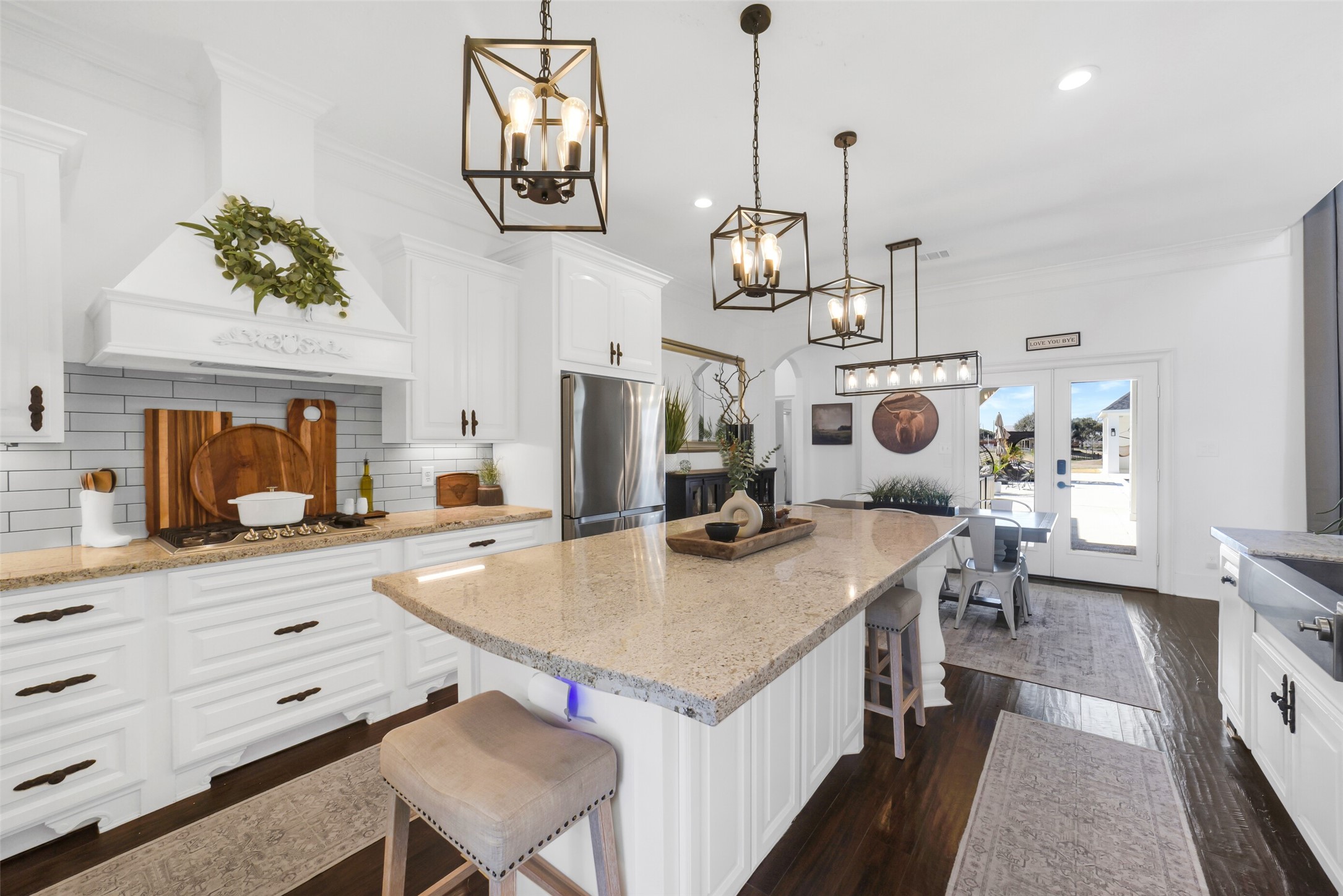 3103 Brundrett Road Wallis, TX 77485 - Photo 16 of 50 Open kitchen layout with large island and adjacent dining area.
