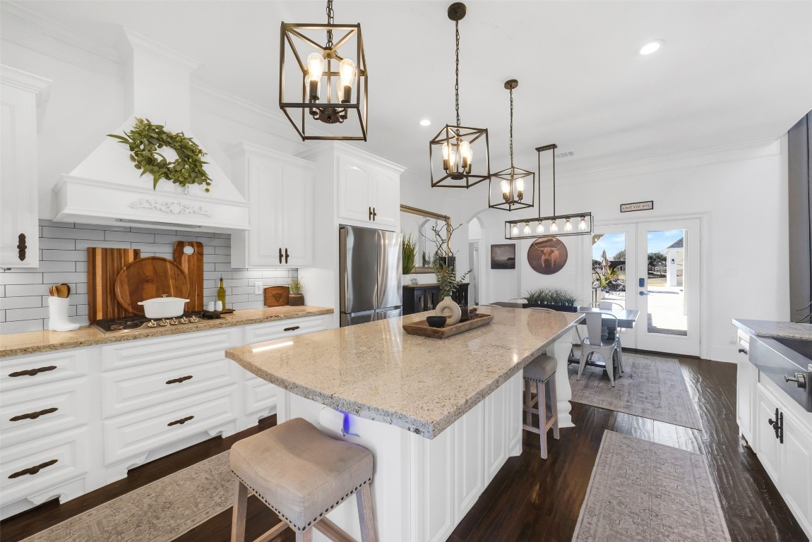 3103 Brundrett Road Wallis, TX 77485 - Photo 16 of 50 a open kitchen with a table and chairs