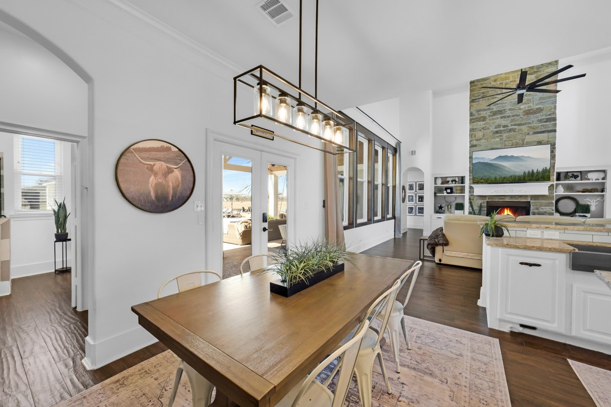 3103 Brundrett Road Wallis, TX 77485 - Photo 18 of 50 Elegant dining area that is seamlessly connected to kitchen and living spaces.