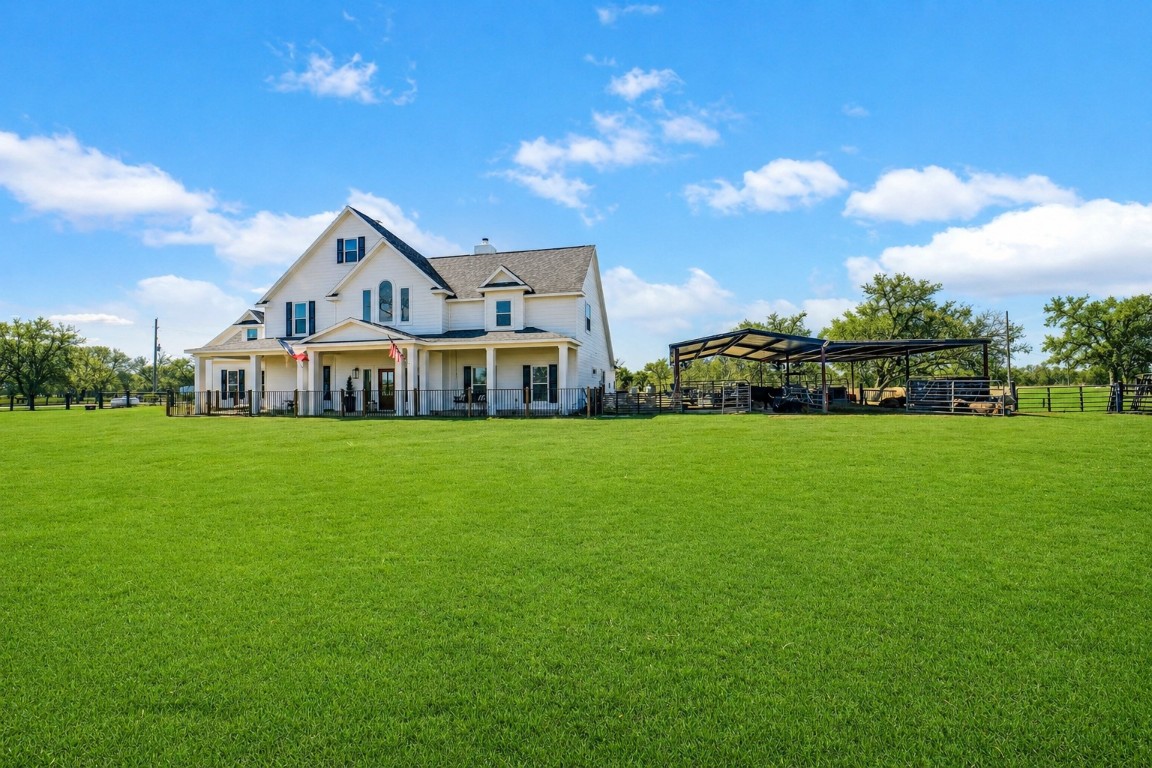 3103 Brundrett Road Wallis, TX 77485 - Photo 2 of 50 a front view of a house with garden