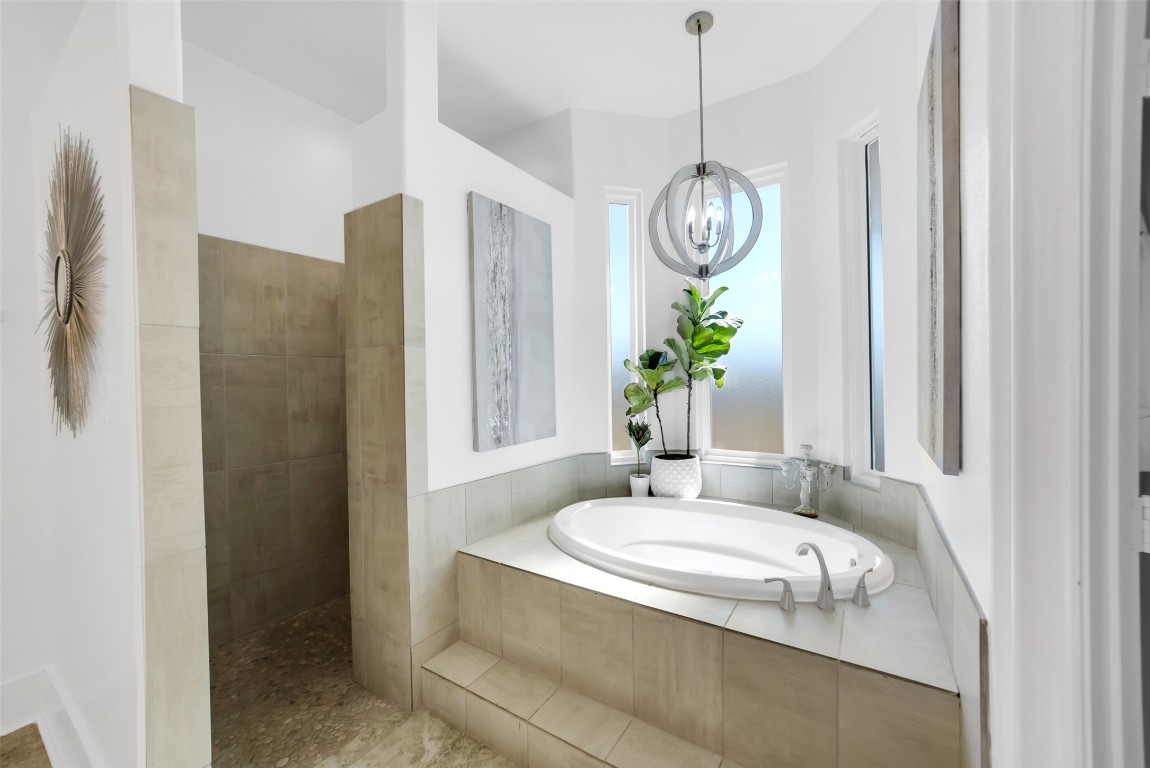 3103 Brundrett Road Wallis, TX 77485 - Photo 24 of 50 Spa-like primary bath featuring a soaking tub and walk-in shower.
