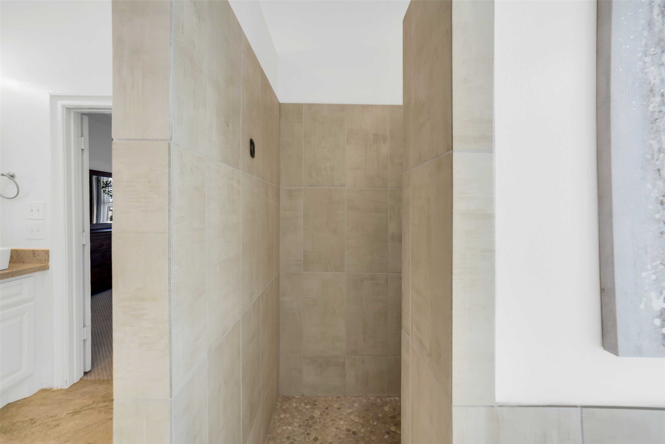 3103 Brundrett Road Wallis, TX 77485 - Photo 25 of 50 Tiled walk-in shower offering a simple and functional layout.