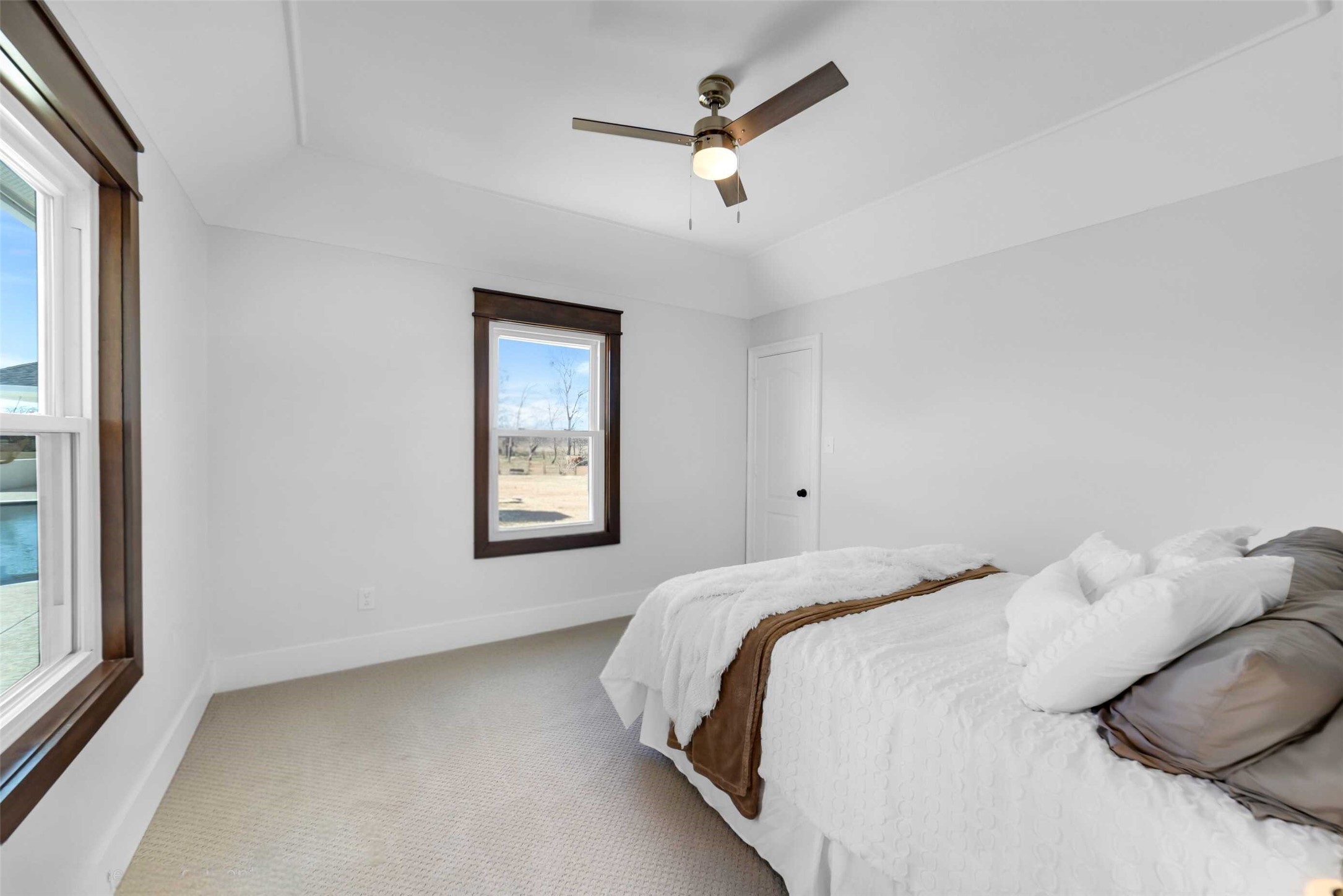 3103 Brundrett Road Wallis, TX 77485 - Photo 28 of 50 Bright secondary bedroom #1 with neutral finishes and natural light.