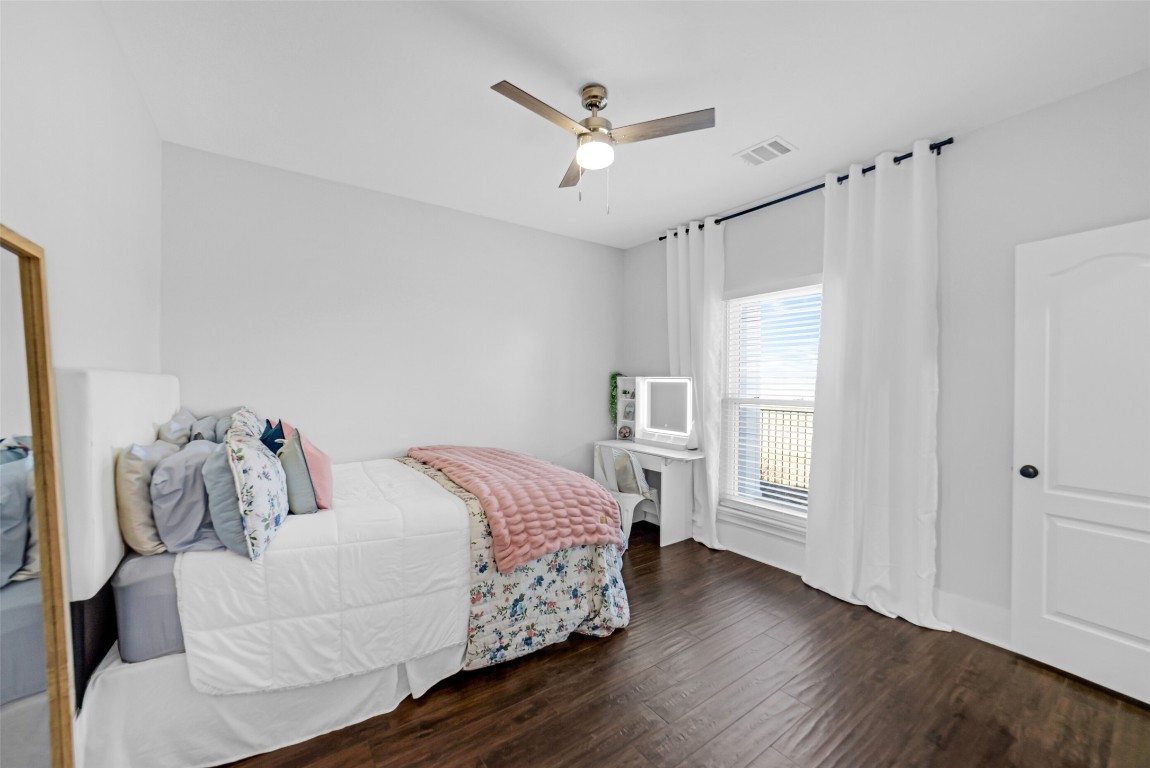 3103 Brundrett Road Wallis, TX 77485 - Photo 30 of 50 a bedroom with a large bed and a window