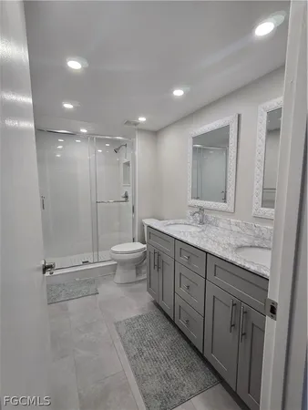 an empty room with a ceiling fan and a window