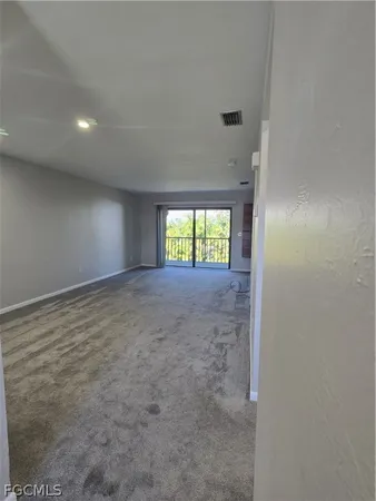 a view of a backyard with a tub and outdoor seating