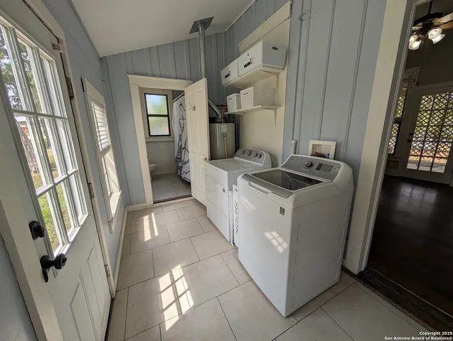 a view of living room washer and dryer
