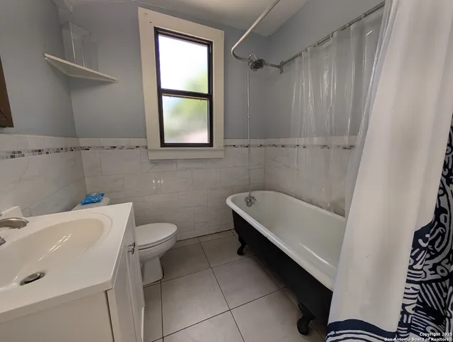 a bathroom with a sink and a bathtub
