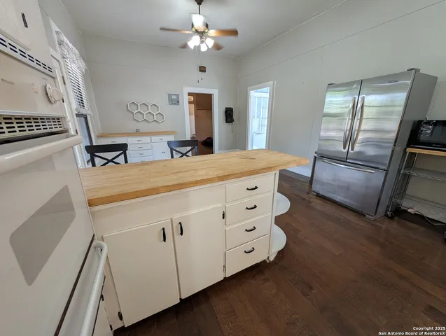 a room with a bed and furniture