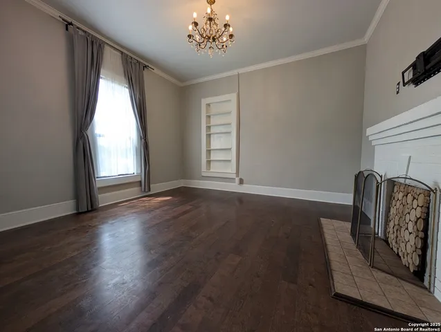 a view of livingroom with hardwood floor and a window