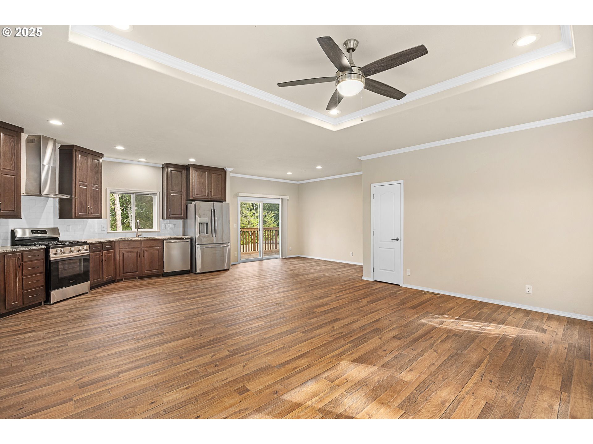 352 North Falcon Street Rockaway Beach, OR 97136 - Photo 11 of 32 a view of a kitchen with a sink and a window