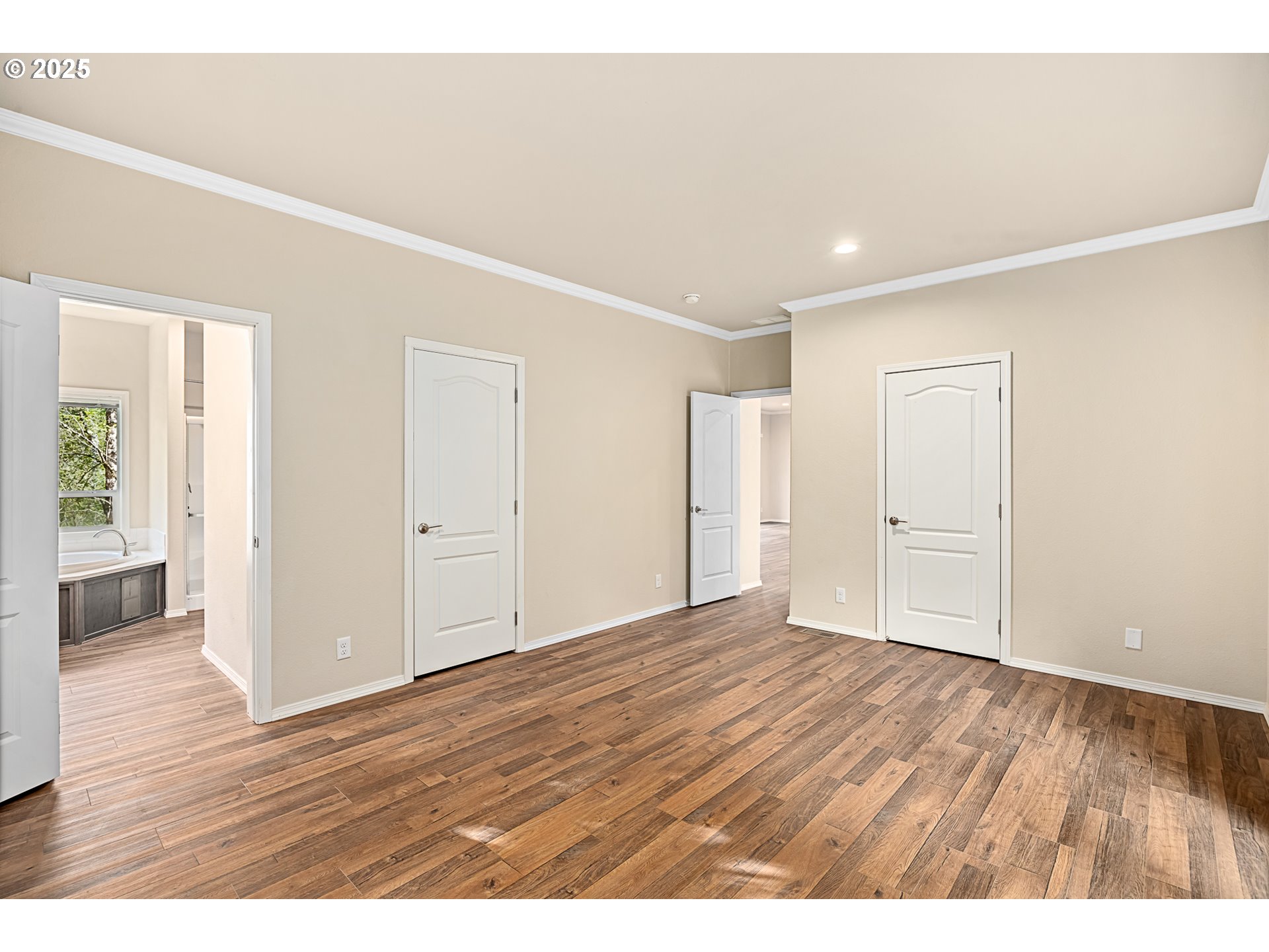352 North Falcon Street Rockaway Beach, OR 97136 - Photo 14 of 32 a view of an empty room with wooden floor