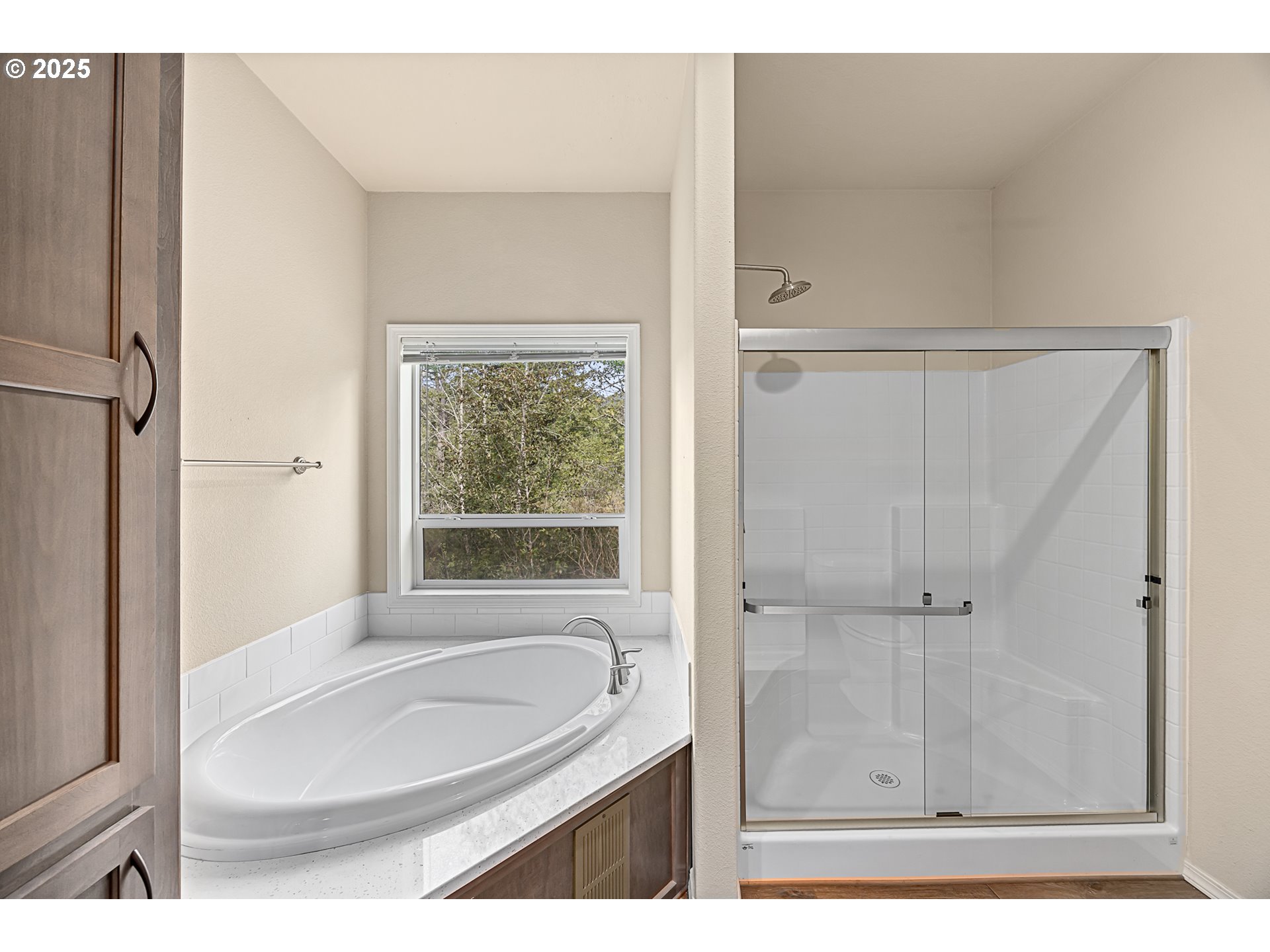 352 North Falcon Street Rockaway Beach, OR 97136 - Photo 16 of 32 a bathroom with a granite countertop sink a toilet and shower