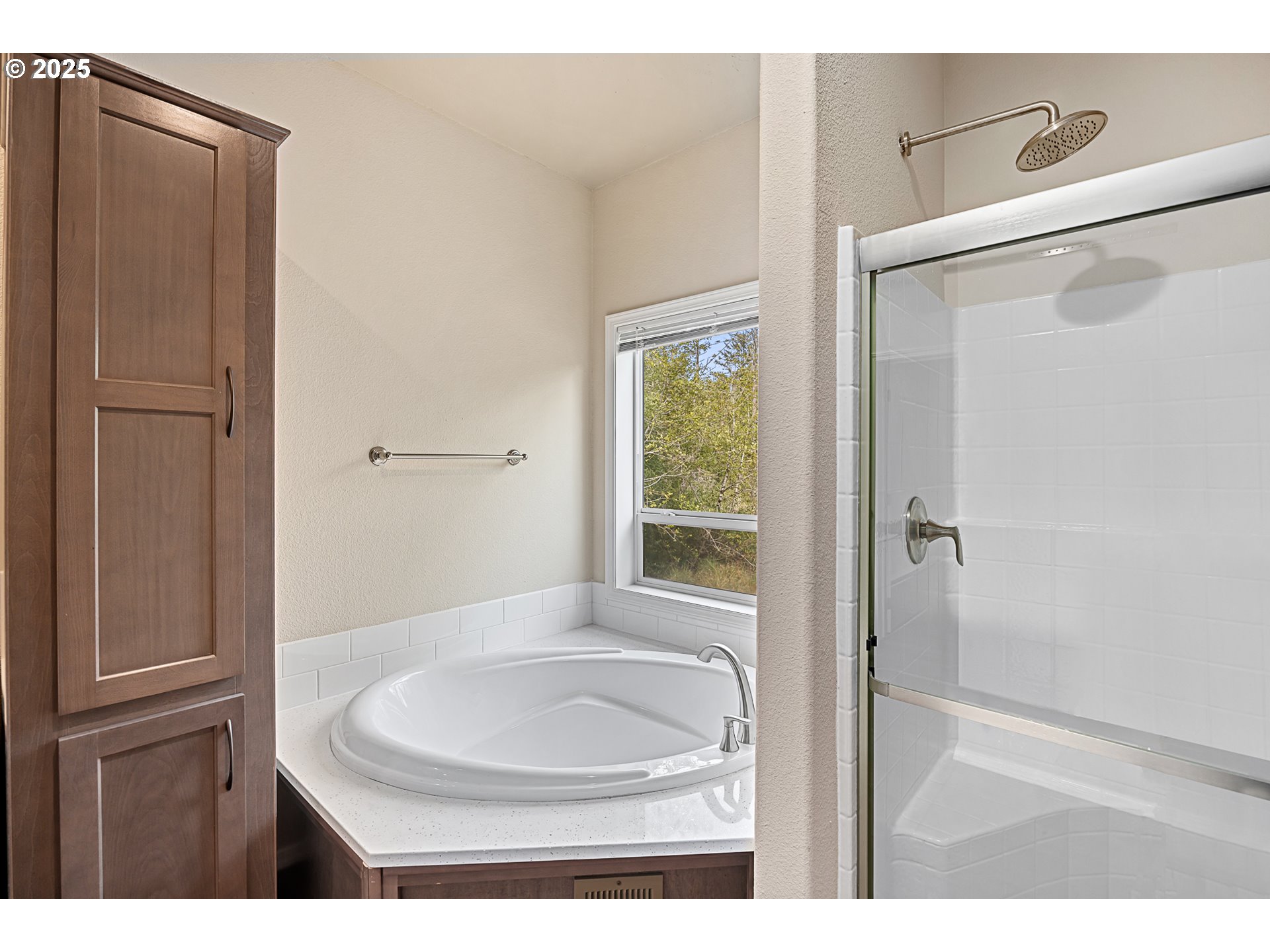 352 North Falcon Street Rockaway Beach, OR 97136 - Photo 17 of 32 a bathroom with a sink and a mirror