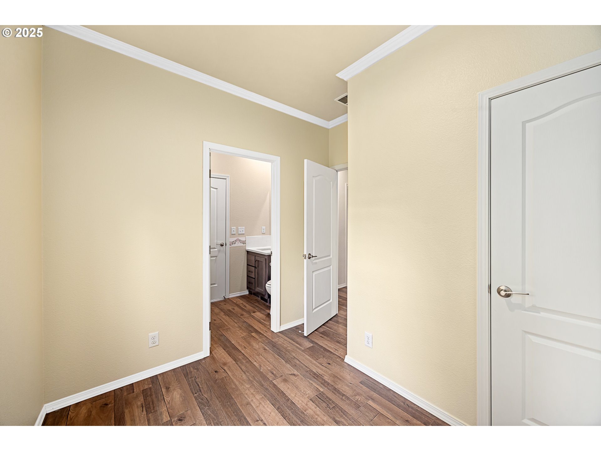 352 North Falcon Street Rockaway Beach, OR 97136 - Photo 22 of 32 a view of an empty room and wooden floor