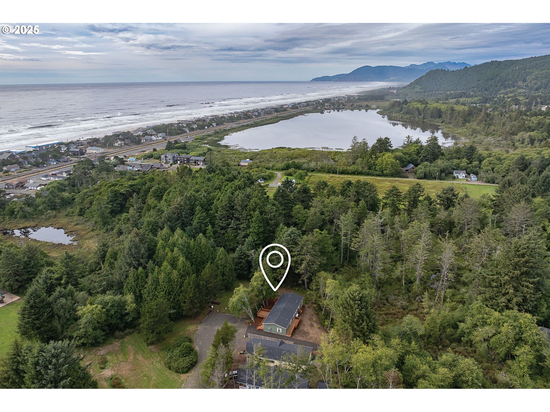 352 North Falcon Street Rockaway Beach, OR 97136 - Photo 30 of 32 a view of a yard with an outdoor space