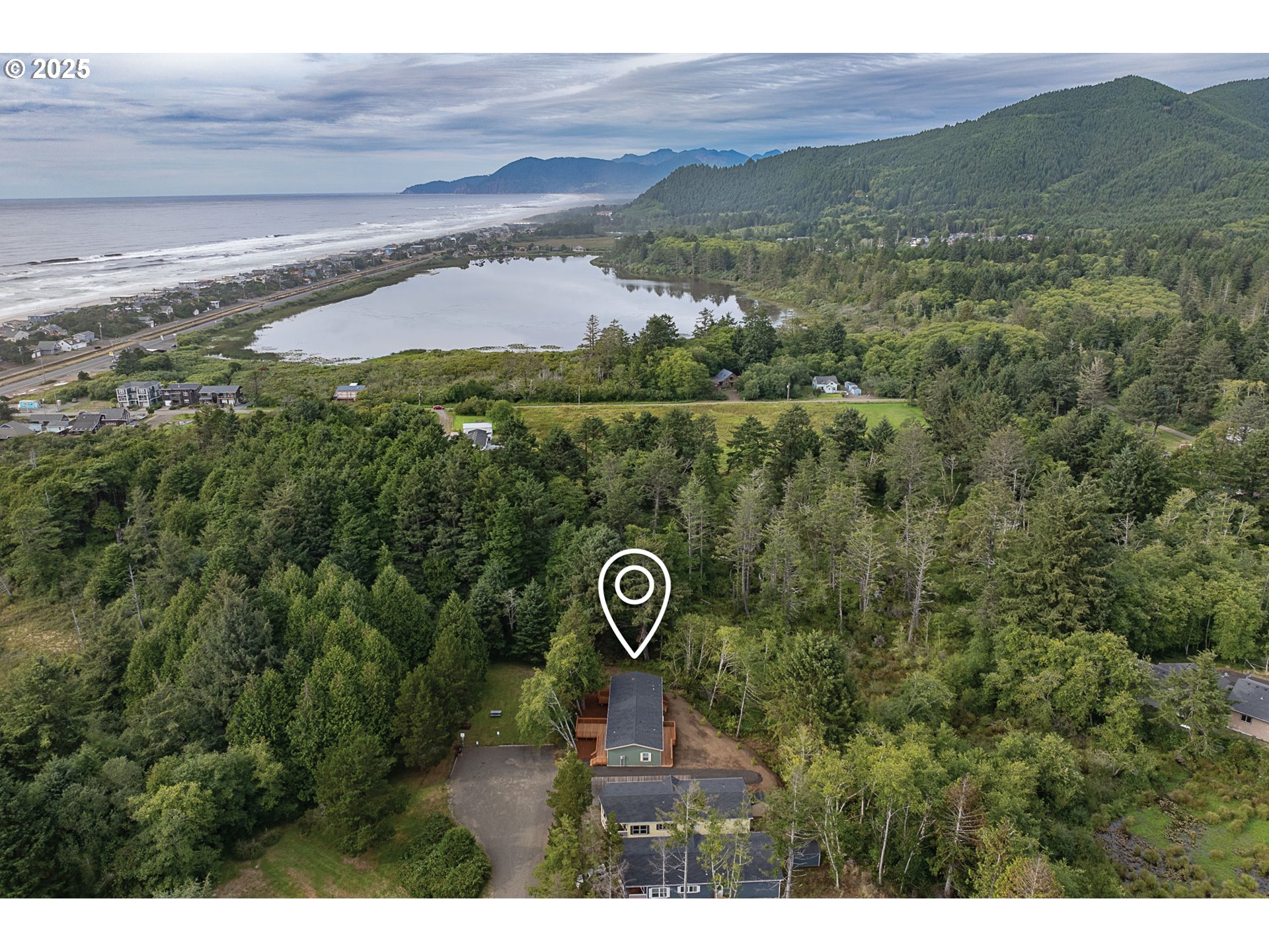352 North Falcon Street Rockaway Beach, OR 97136 - Photo 31 of 32 a view of a yard with an outdoor space