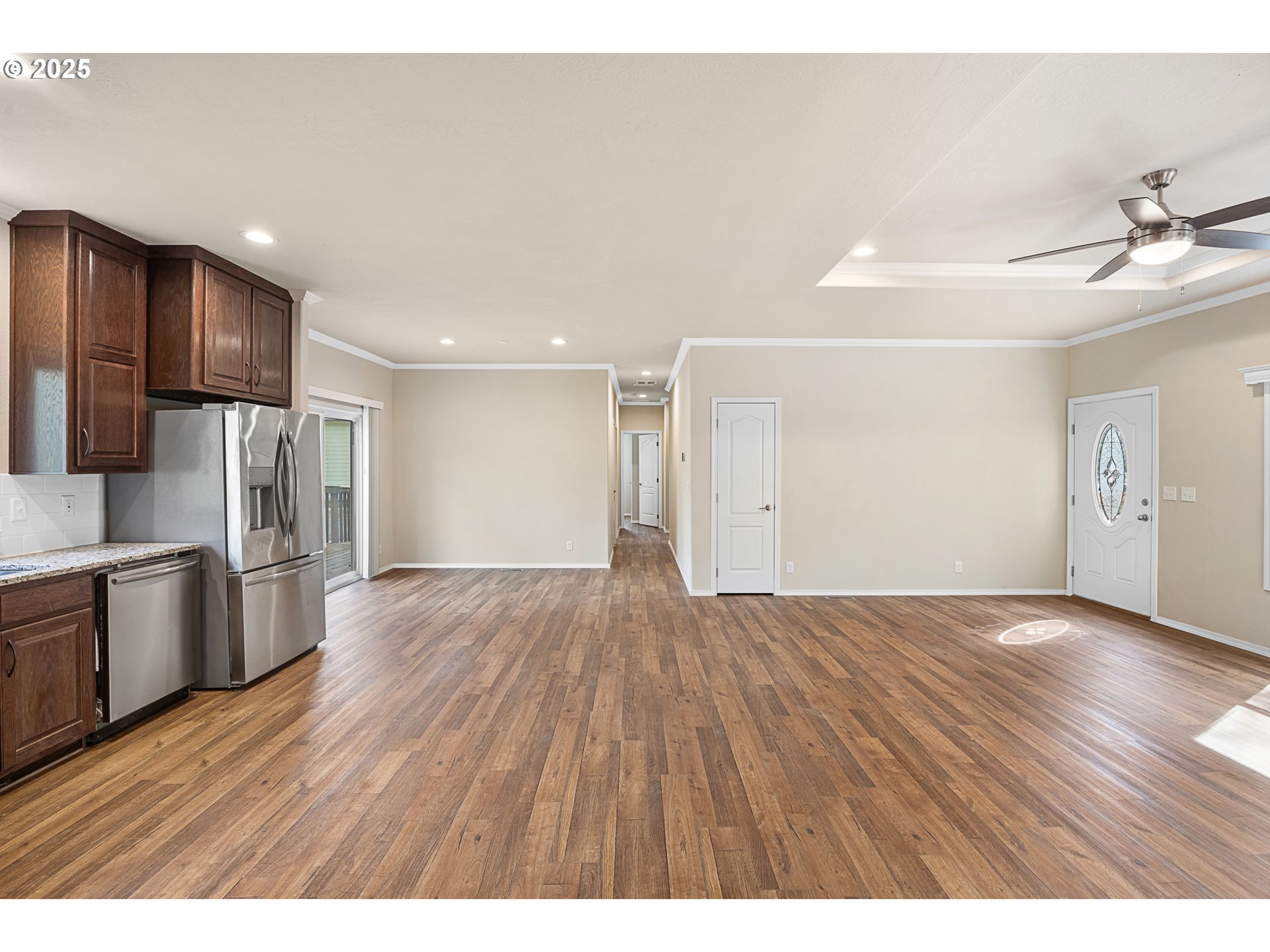352 North Falcon Street Rockaway Beach, OR 97136 - Photo 6 of 32 a view interior of a house an empty space wooden floor and a window