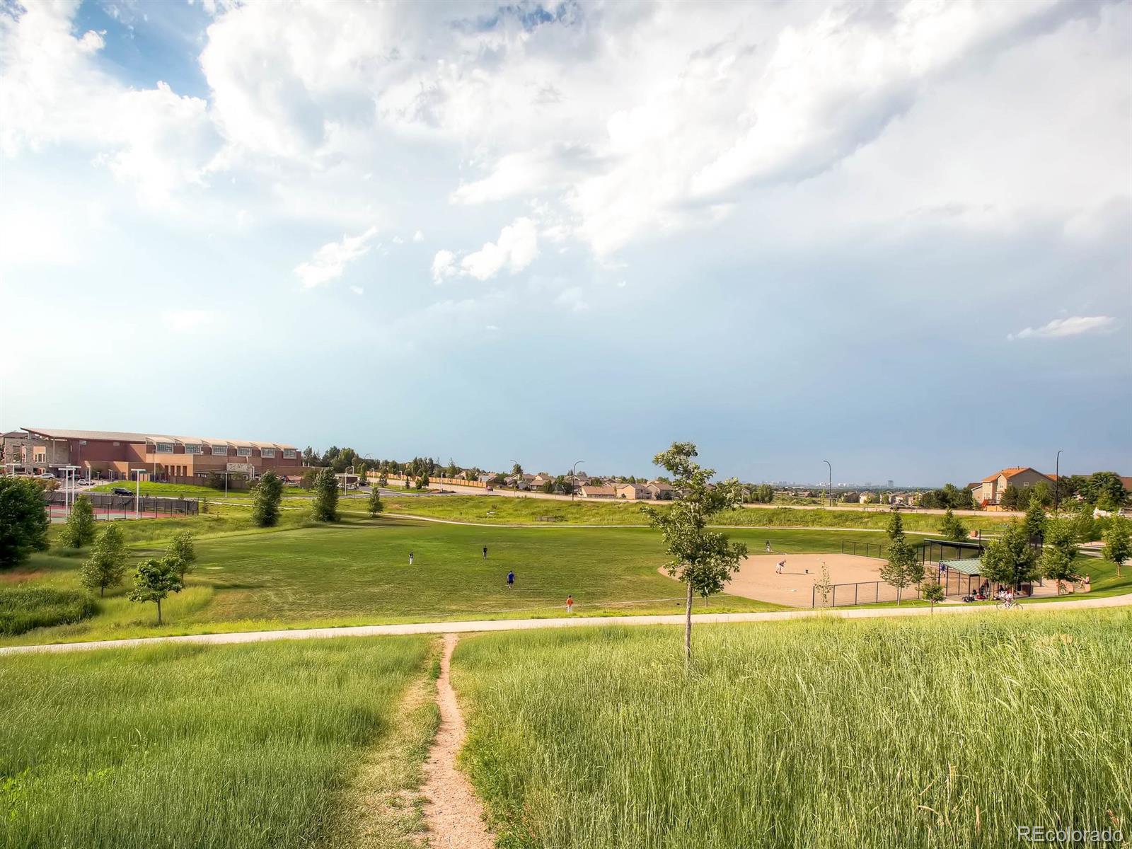 10824 Towerbridge Road Highlands Ranch, CO 80130 - Photo 26 of 33 a view of an ocean and beach
