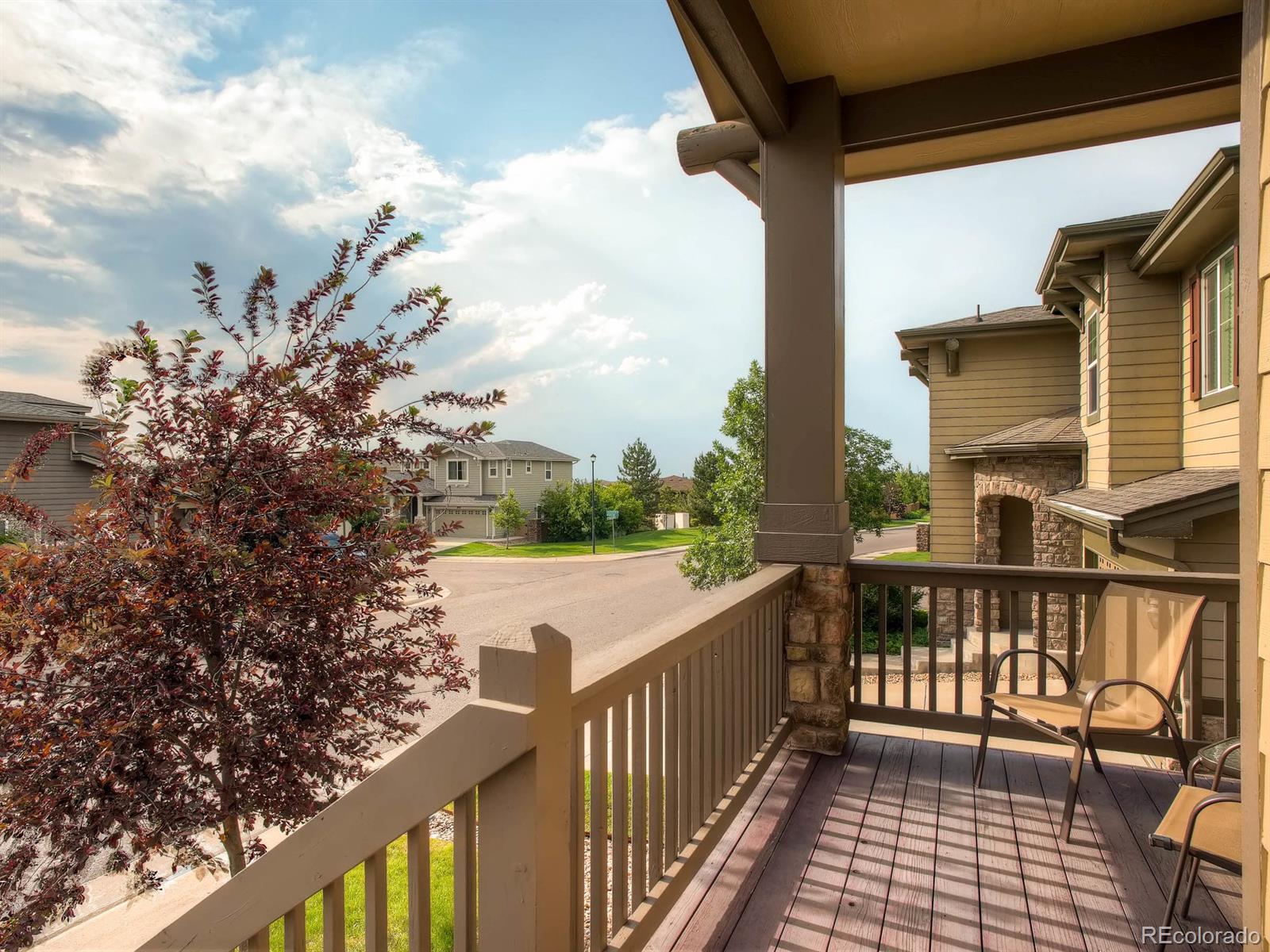 10824 Towerbridge Road Highlands Ranch, CO 80130 - Photo 33 of 33 a view of a balcony with wooden floor