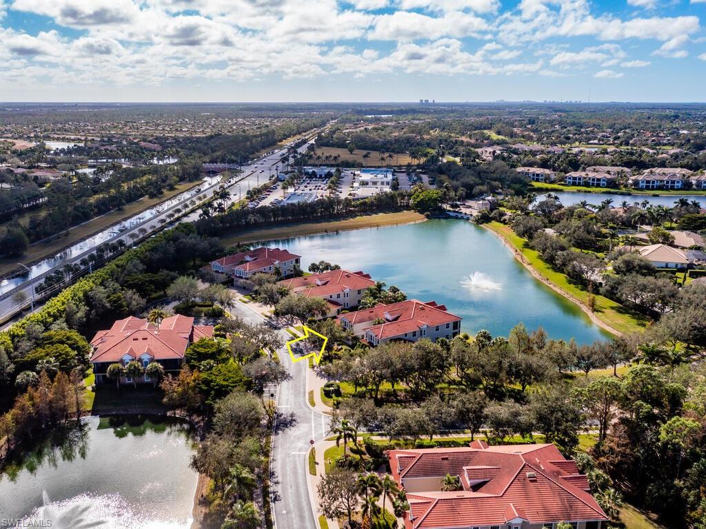 7869 Hawthorne Drive, Unit 303 Naples, FL 34113 - Photo 32 of 50 Bird's eye view with a water view