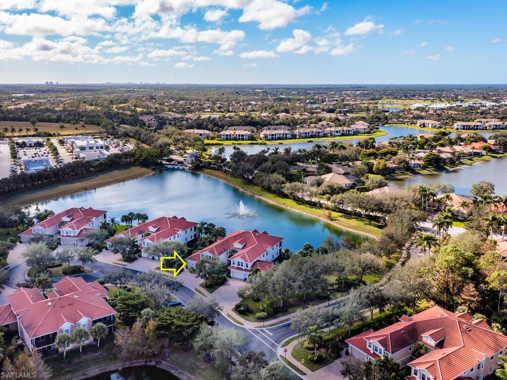 7869 Hawthorne Drive, Unit 303 Naples, FL 34113 - Photo 33 of 50 Aerial view with a water view