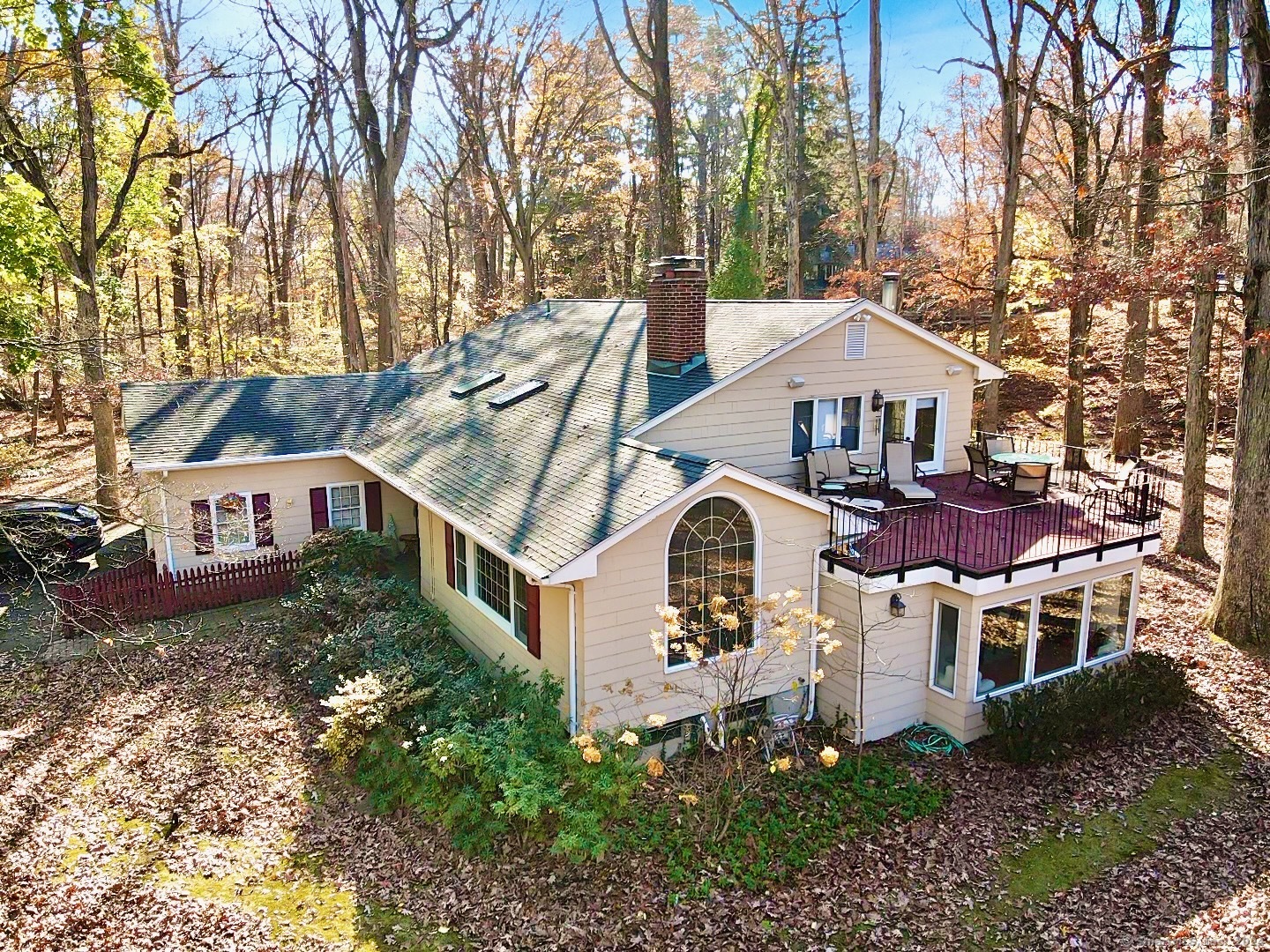 1 Meeting Grove Lane Norwalk, CT 06850 - Photo 1 of 1 a front view of a house with a yard and garage