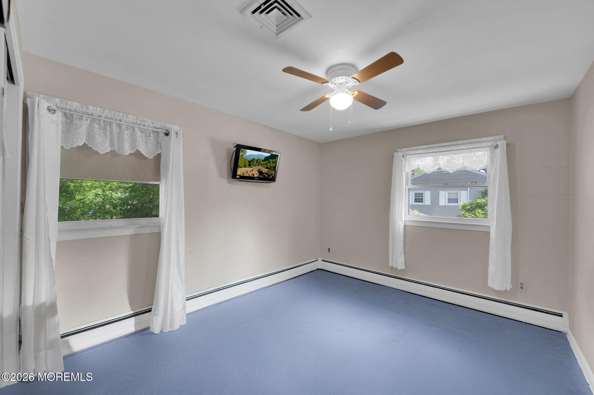 2604 Logan Road Asbury Park, NJ 07712 - Photo 17 of 39 a view of an empty room with a window