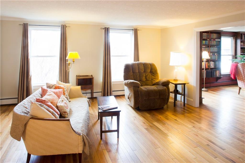 71 Goshen Road Winterport, ME 04496 - Photo 15 of 35 Living room with atrium door to hot...