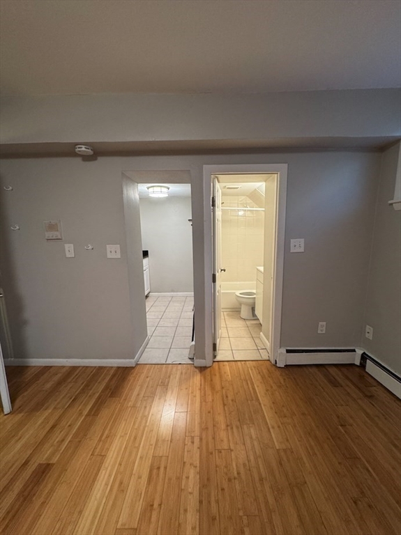 120 Charles Street, Unit 1 Boston, MA 02114 - Photo 3 of 4 wooden floor in a room
