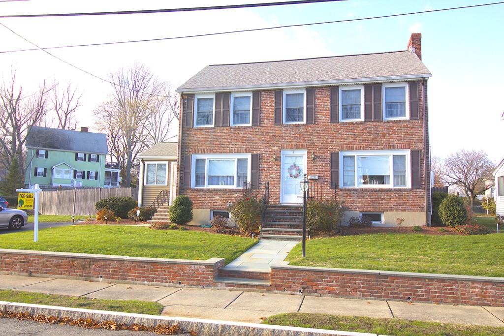41 Lodge Road Newton, MA 02465 - Photo 1 of 25 a front view of a house with a yard