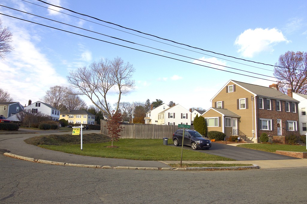 41 Lodge Road Newton, MA 02465 - Photo 2 of 25 a front view of a house with a yard