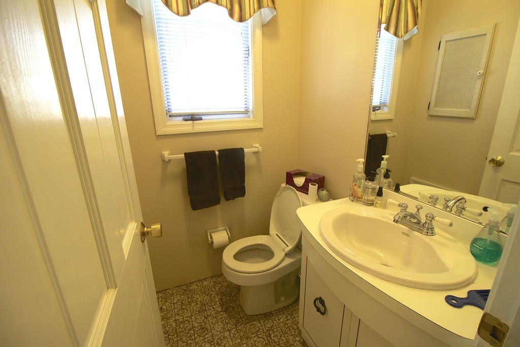 41 Lodge Road Newton, MA 02465 - Photo 8 of 25 a bathroom with a sink and a toilet