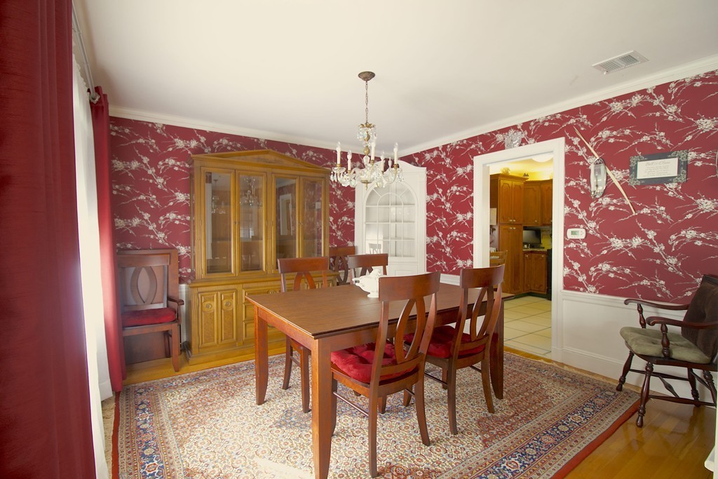 41 Lodge Road Newton, MA 02465 - Photo 10 of 25 a view of a dining room with furniture and window