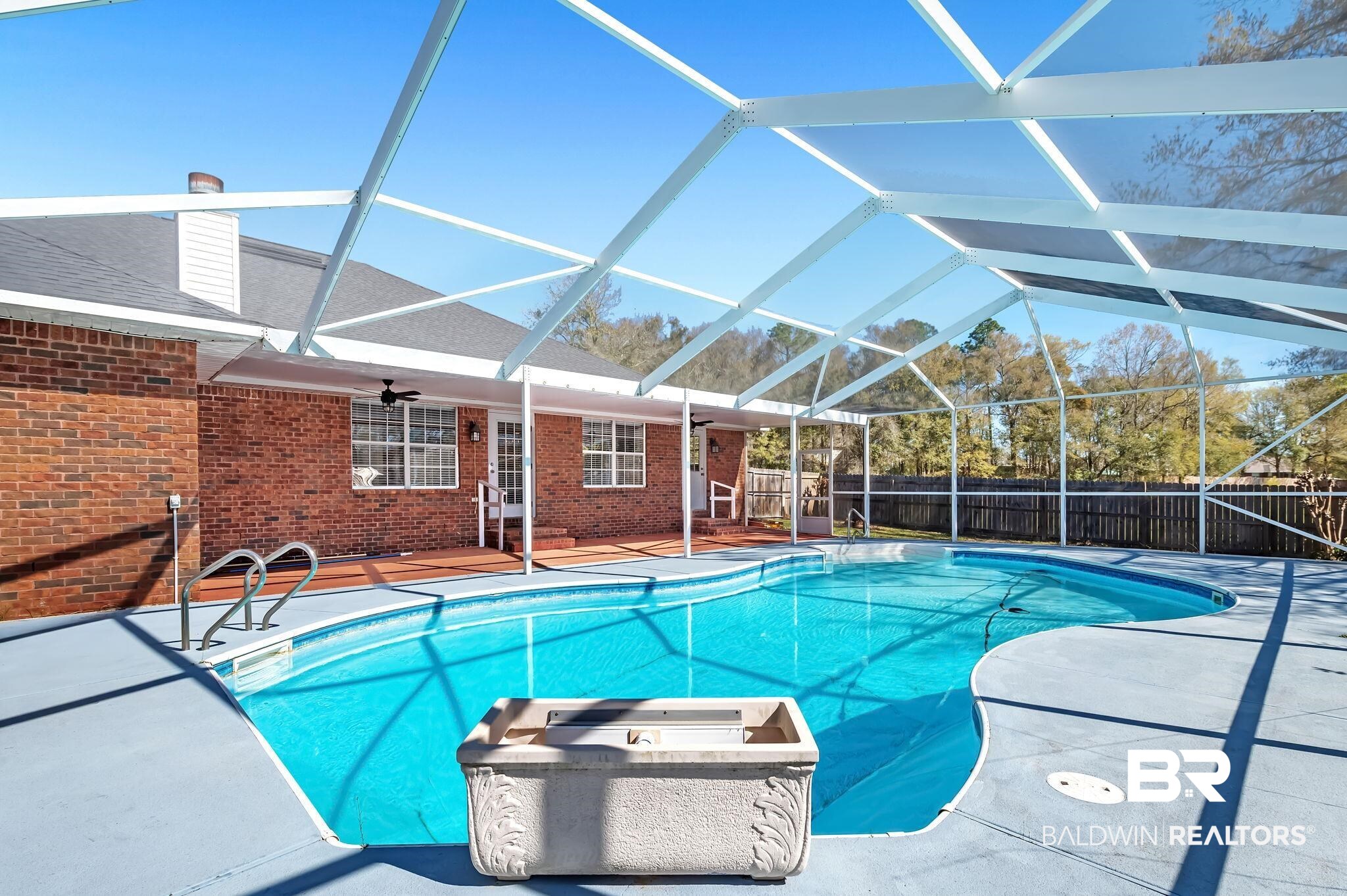 16444 Hamlet Lane Foley, AL 36535 - Photo 6 of 49 View of swimming pool with glass enclosure, a patio area, a fenced in pool, a ceiling fan, and fence private yard