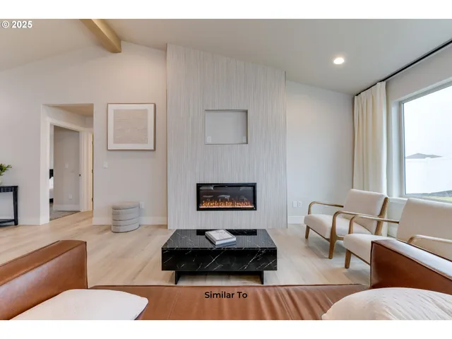 a living room with furniture and a couch