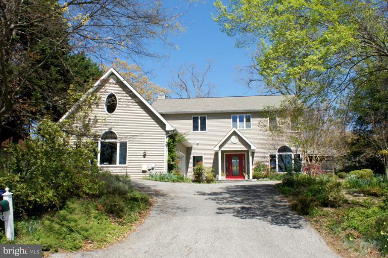 1421 Oak Bluff Road Edgewater, MD 21037 - Photo 12 of 30 a view of front of house with wooden fence