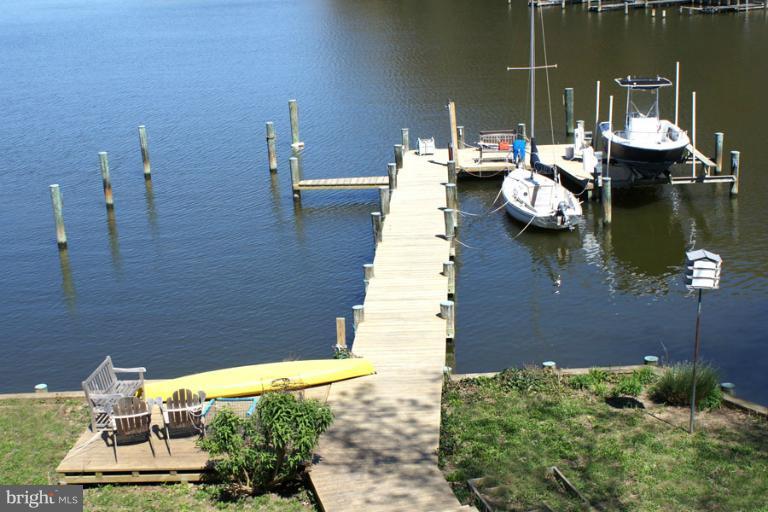 1421 Oak Bluff Road Edgewater, MD 21037 - Photo 15 of 30 a view of a lake with sitting area